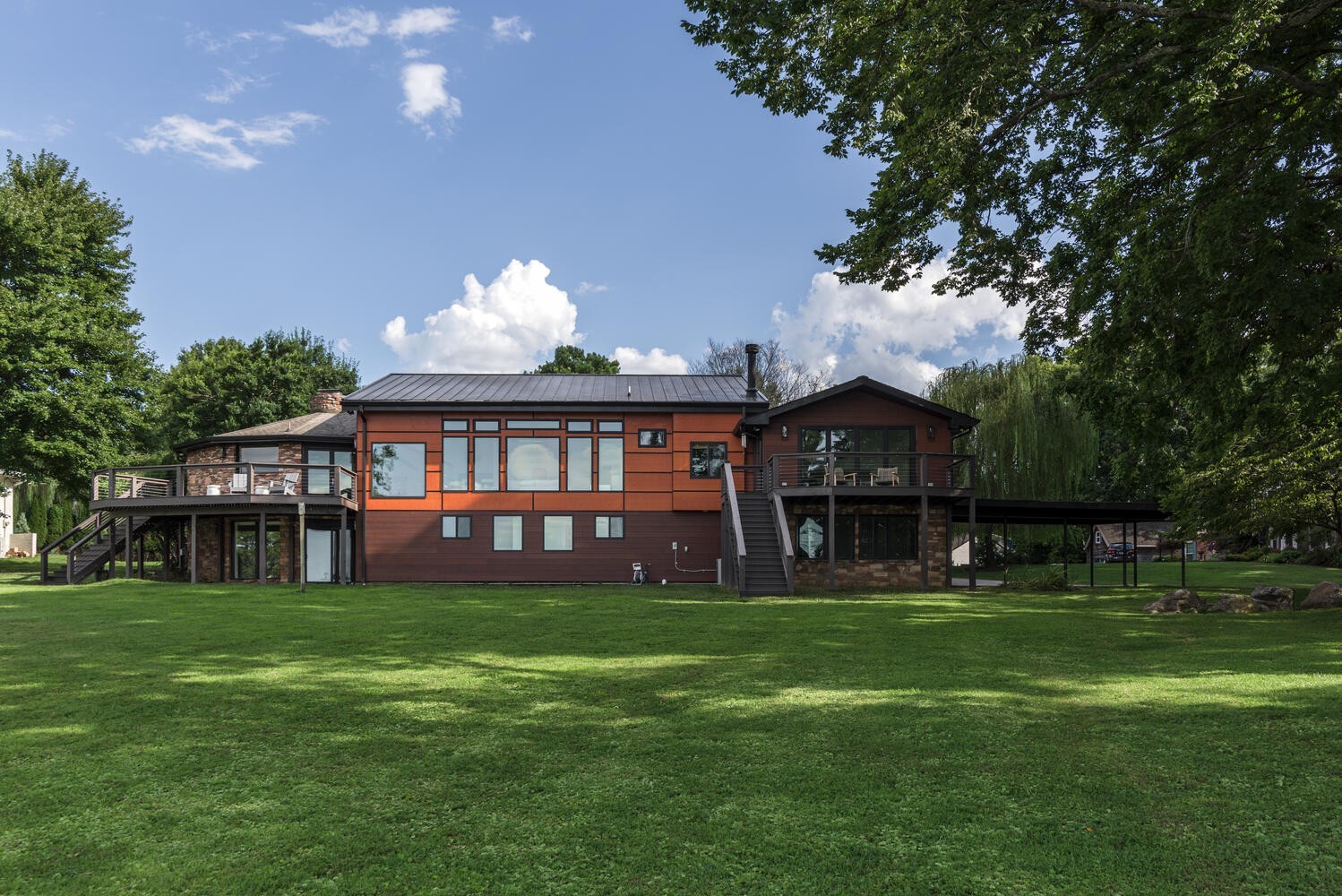 104 Windward Point Hendersonville, TN 37075 - Photo 44 of 49 a view of a house next to a big yard with large trees