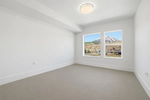 an empty room with windows