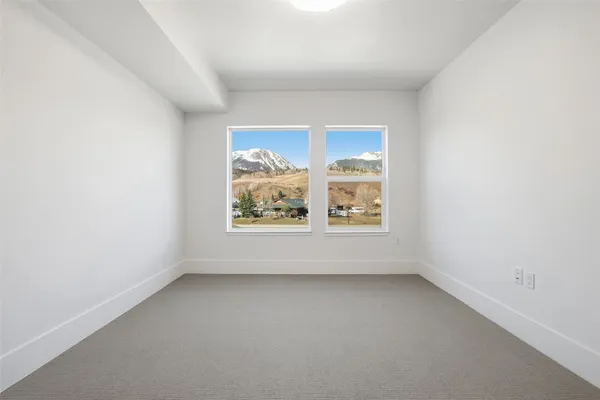 an empty room with window