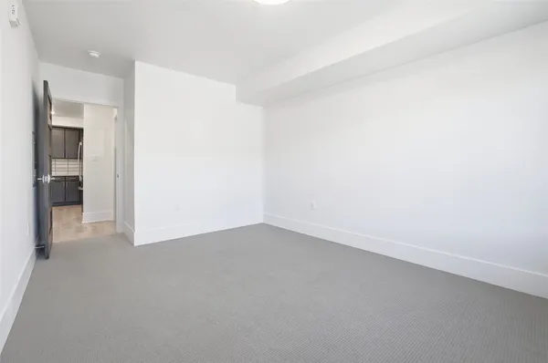 an empty room with an entryway