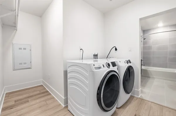 a utility room with dryer and washer