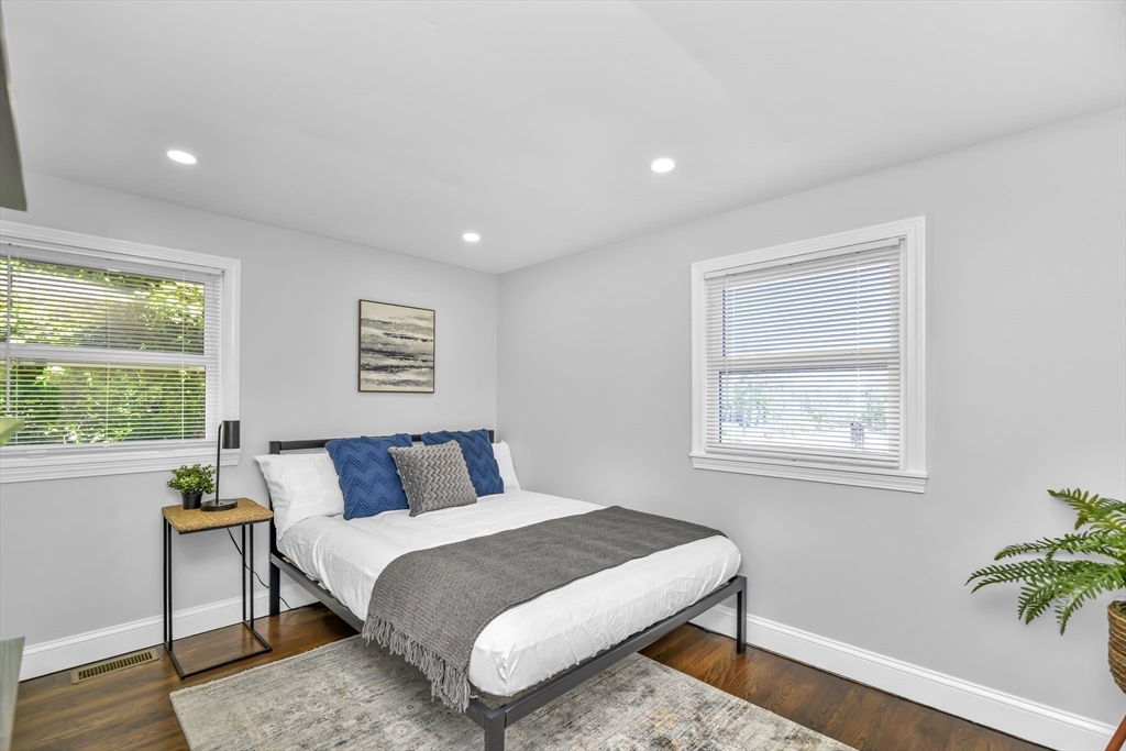36 Dietz Road Boston, MA 02136 - Photo 19 of 31 a bedroom with a bed and a window