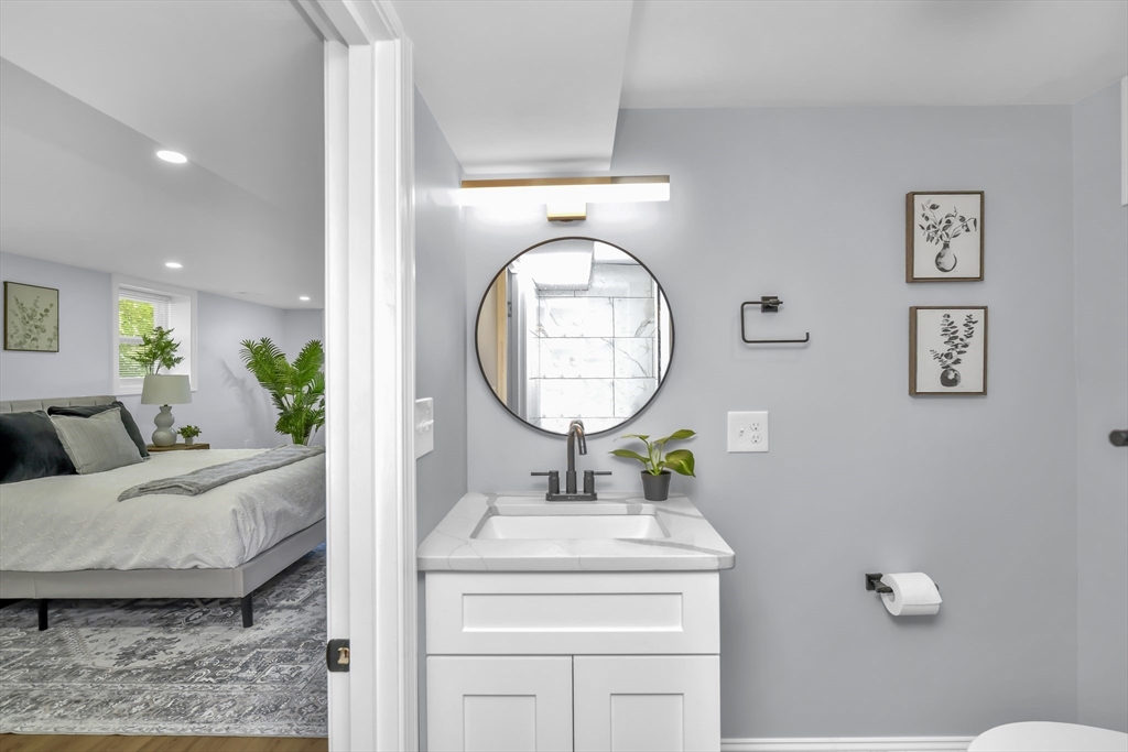 36 Dietz Road Boston, MA 02136 - Photo 24 of 31 a living room with a mirror and a table