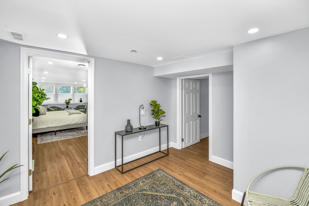 36 Dietz Road Boston, MA 02136 - Photo 25 of 31 a view of a hallway and wooden floor and a livingroom