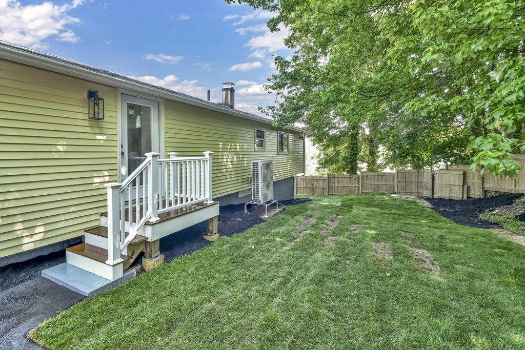 36 Dietz Road Boston, MA 02136 - Photo 28 of 31 a view of a house with a yard and deck