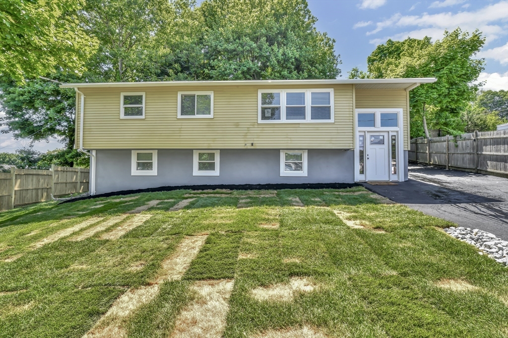 36 Dietz Road Boston, MA 02136 - Photo 29 of 31 a front view of a house with a garden