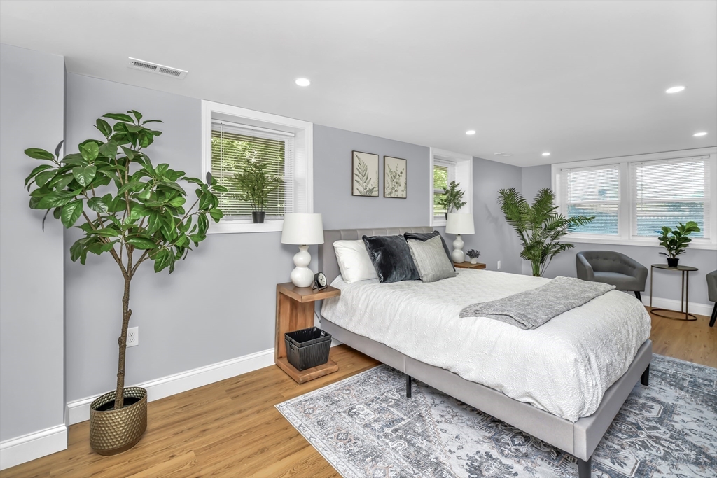 36 Dietz Road Boston, MA 02136 - Photo 6 of 31 a bed room with a bed and a potted plant