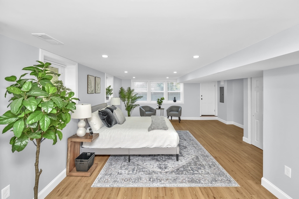 36 Dietz Road Boston, MA 02136 - Photo 7 of 31 a living room with furniture and a potted plant