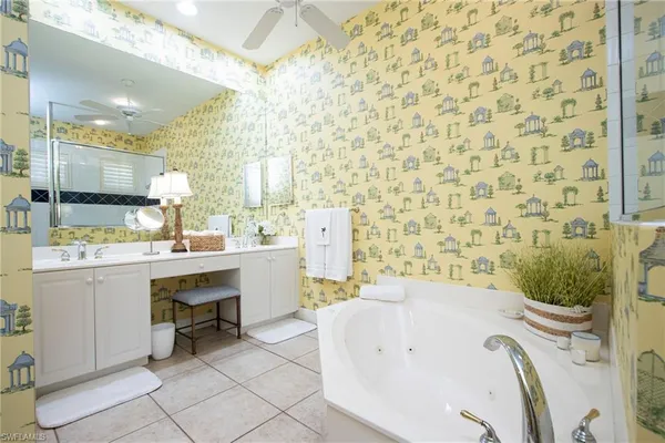 a bathroom with a sink a bathtub and a sink