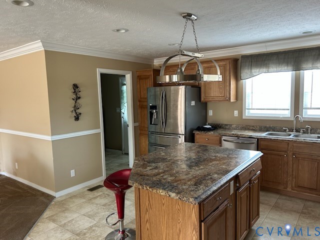 15910 Nobles Road Disputanta, VA 23842 - Photo 9 of 38 Kitchen featuring a center island, stainless steel