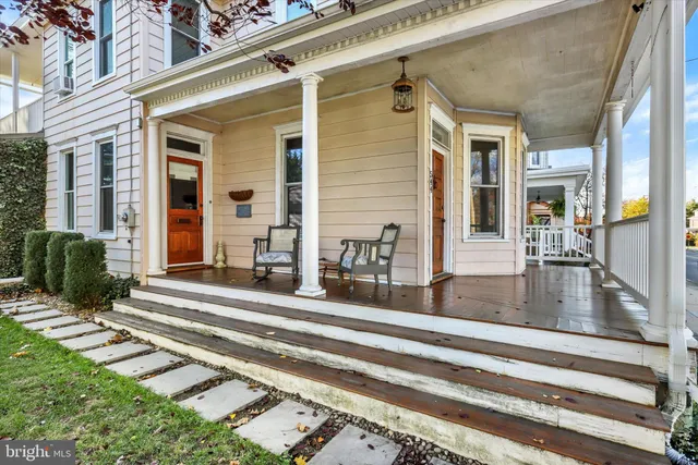 a view of a building with a fountain and a fountain