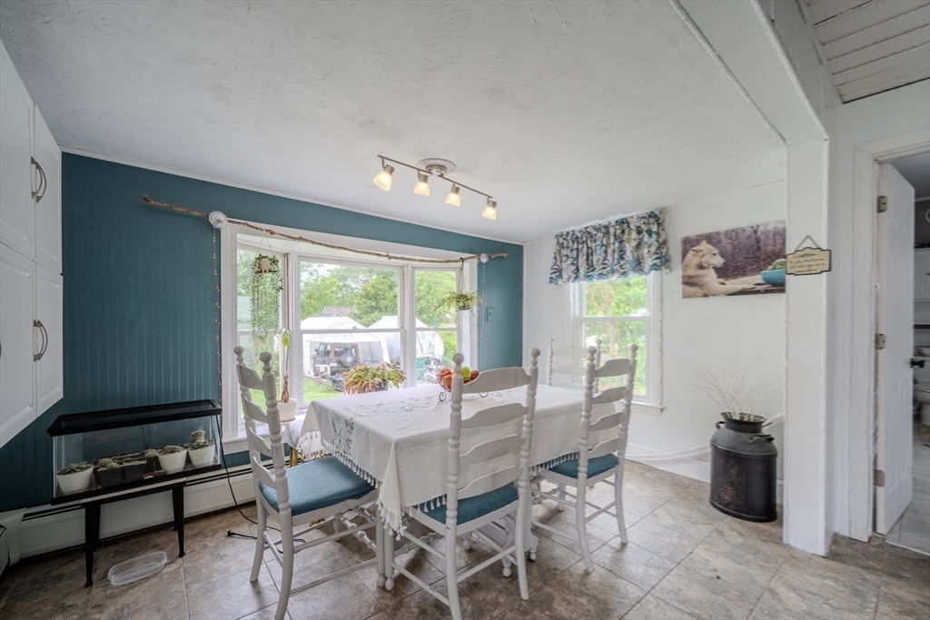 29 3rd Street Ayer, MA 01432 - Photo 9 of 29 a view of a dining room with furniture window and outside view