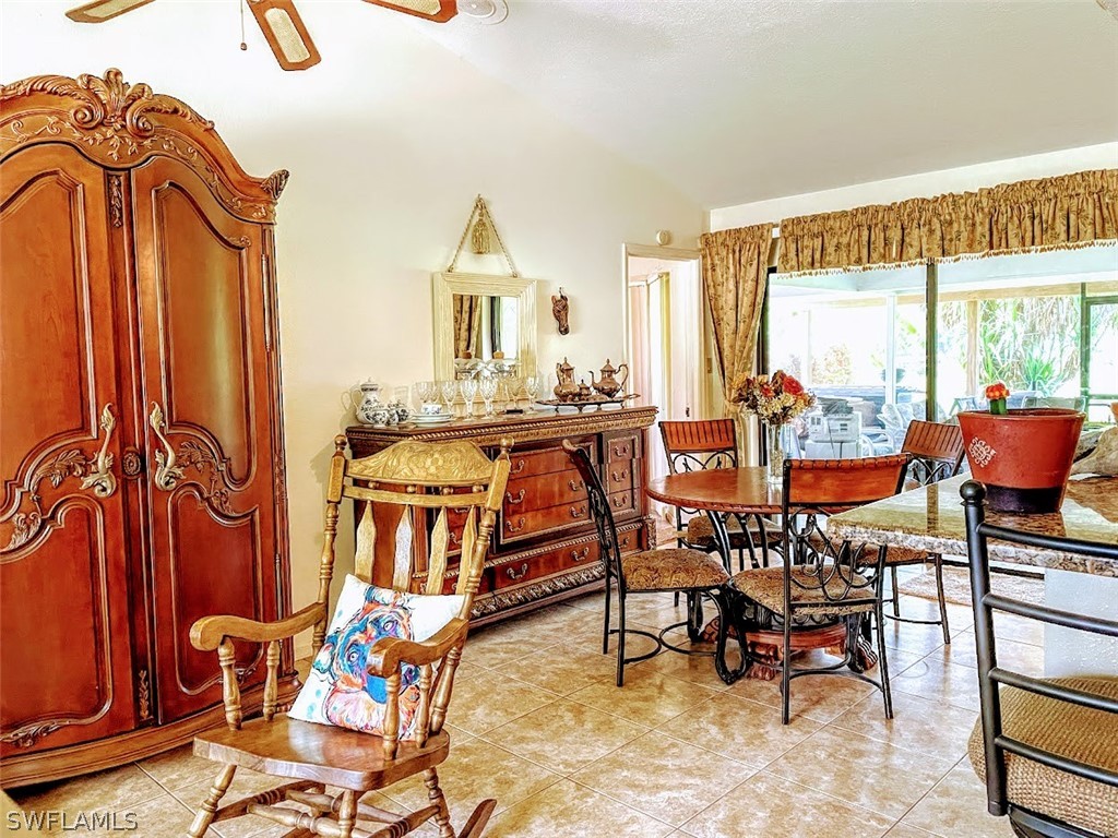 3015 Shell Lane LaBelle, FL 33935 - Photo 13 of 24 a view of a dining room with furniture window and outside view