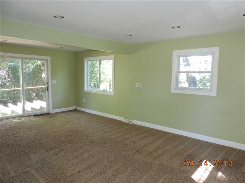 170 Ridgewood Road Pittsburgh, PA 15237 - Photo 6 of 13 Family Room. The first floor family room is huge with recessed lighting and sliders to the future deck
