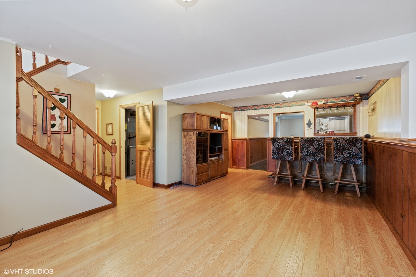 355 Chenault Road Buffalo Grove, IL 60089 - Photo 12 of 26 a dining room with furniture and entryway with furniture