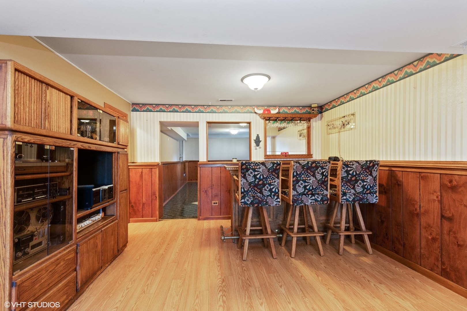 355 Chenault Road Buffalo Grove, IL 60089 - Photo 13 of 26 a dining room with furniture window and wooden floor