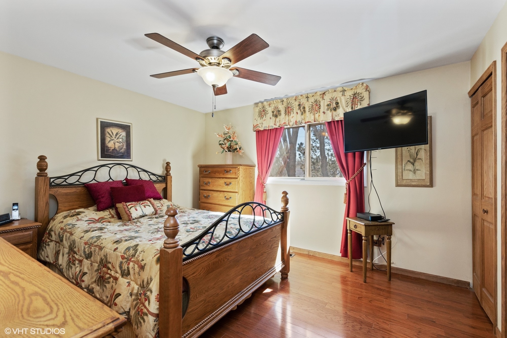 355 Chenault Road Buffalo Grove, IL 60089 - Photo 18 of 26 a bedroom with a bed and a chandelier