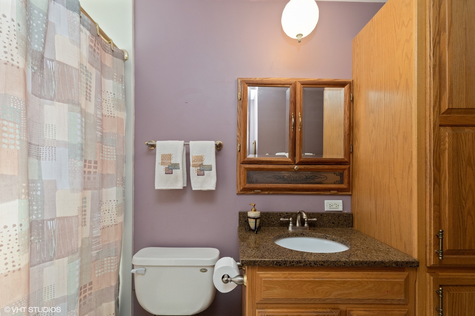 355 Chenault Road Buffalo Grove, IL 60089 - Photo 20 of 26 a bathroom with a granite countertop toilet sink and mirror