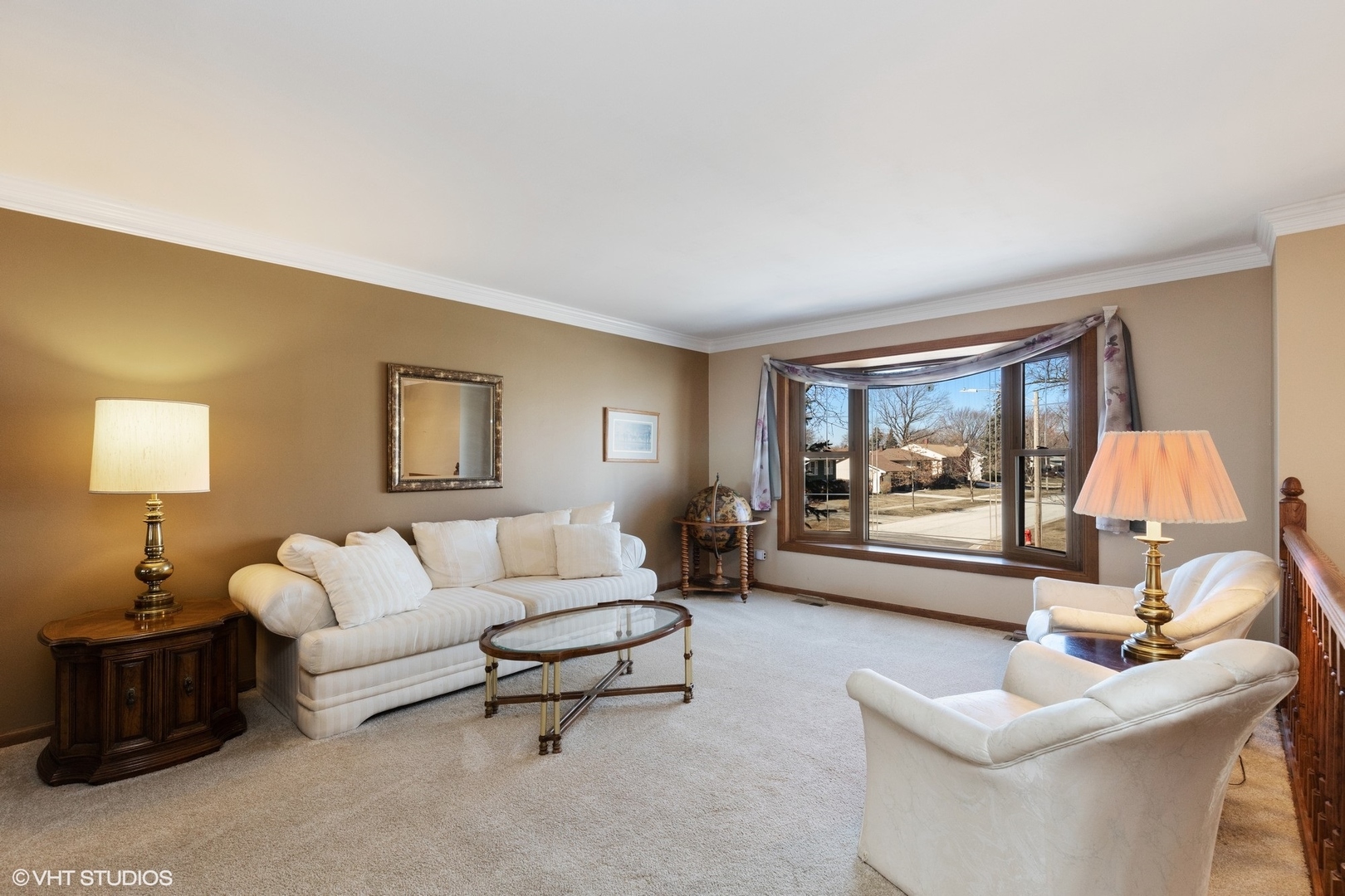 355 Chenault Road Buffalo Grove, IL 60089 - Photo 2 of 26 a living room with furniture and a lamp