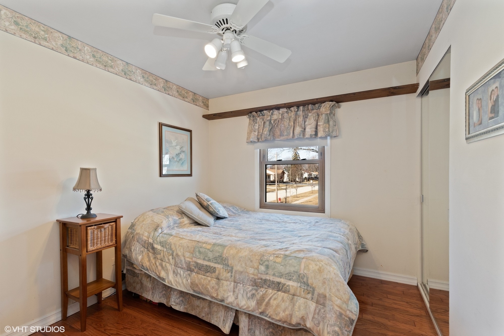 355 Chenault Road Buffalo Grove, IL 60089 - Photo 22 of 26 a bedroom with a bed and a window