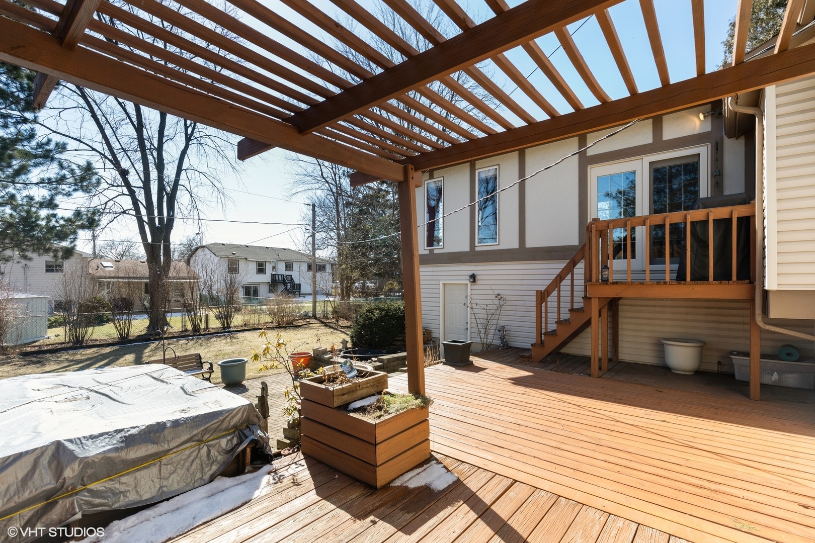 355 Chenault Road Buffalo Grove, IL 60089 - Photo 24 of 26 a view of a patio with couches chairs and wooden floor