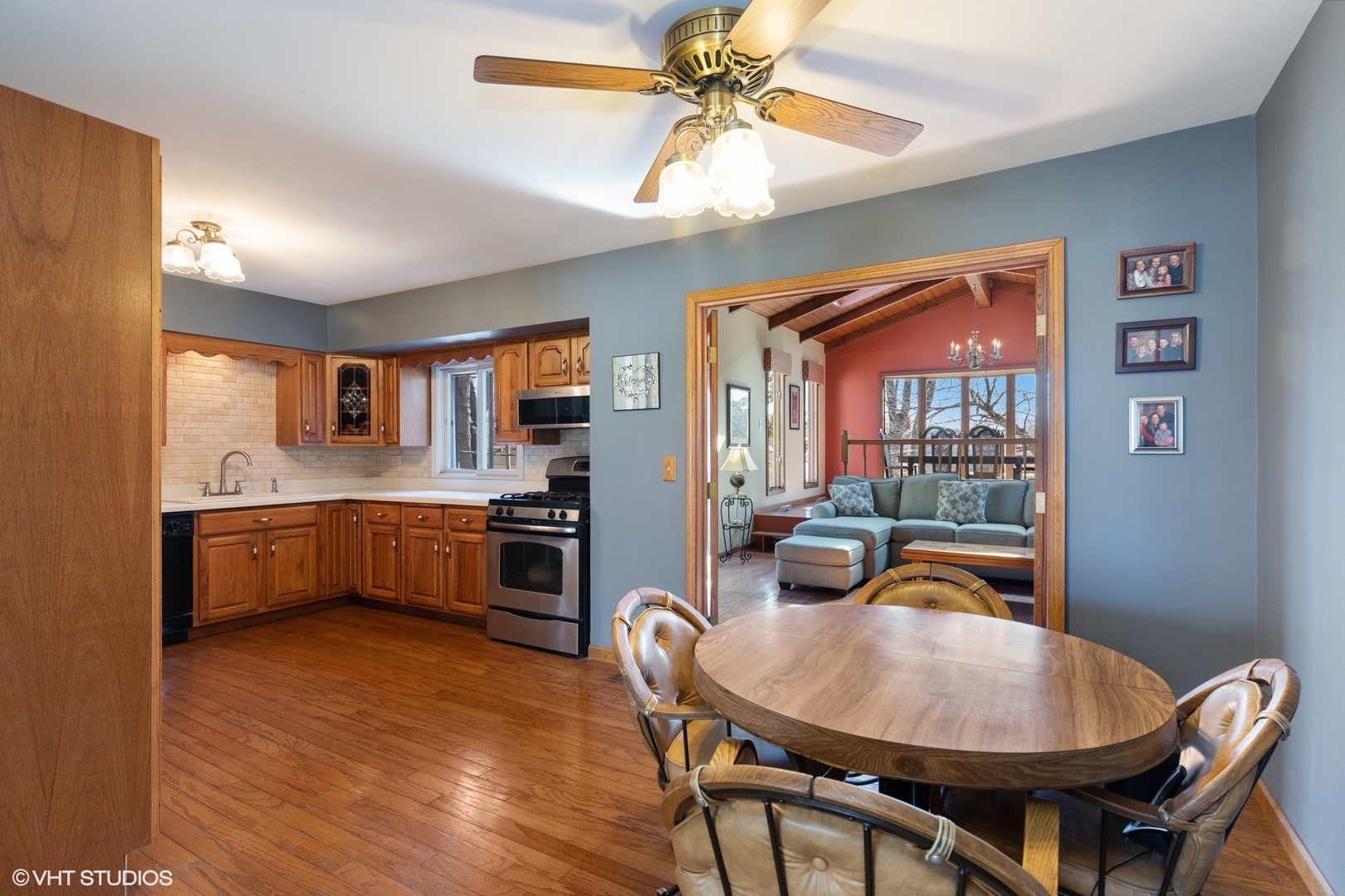 355 Chenault Road Buffalo Grove, IL 60089 - Photo 4 of 26 a view of a dining room with furniture and wooden floor