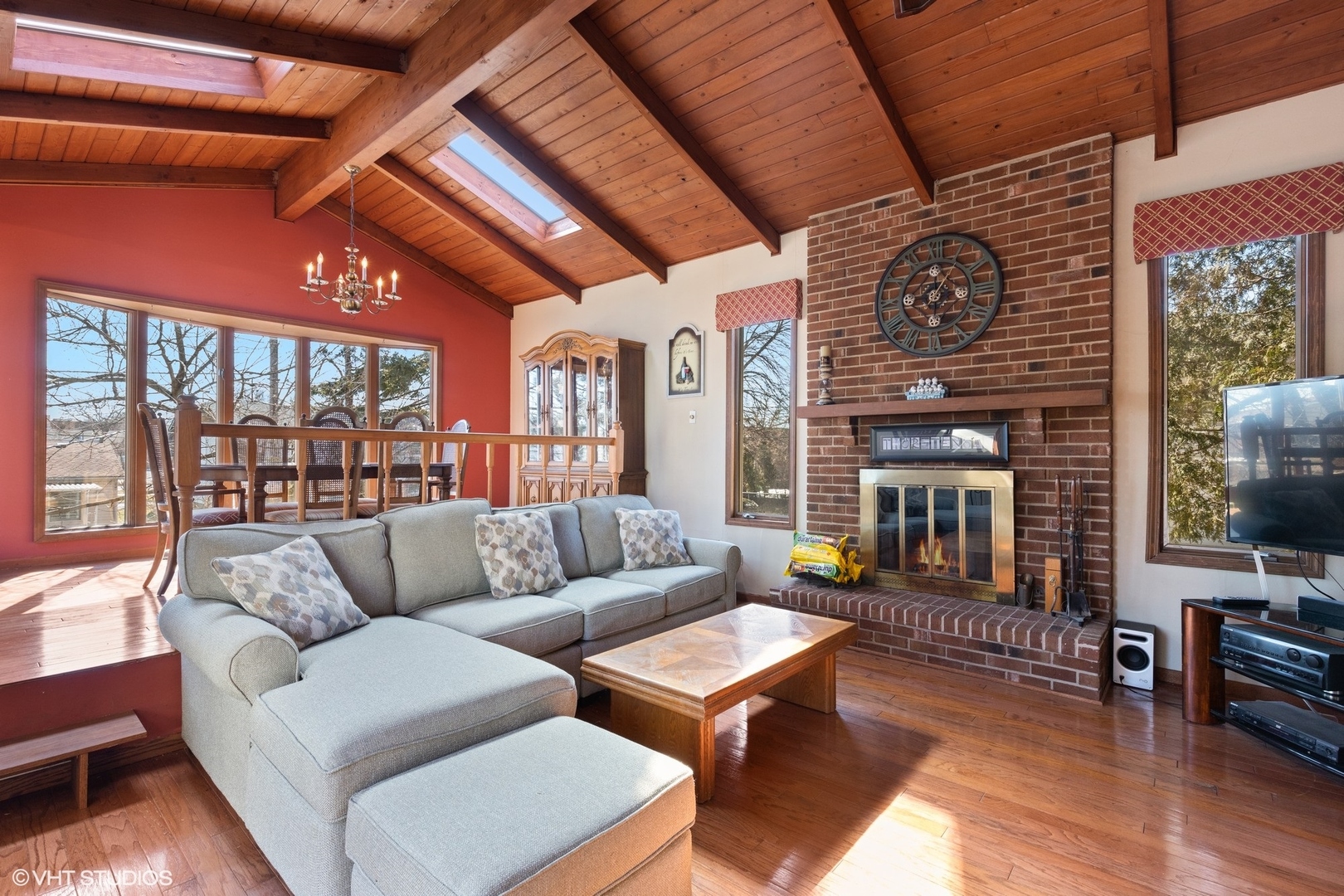 355 Chenault Road Buffalo Grove, IL 60089 - Photo 8 of 26 a living room with furniture and a fireplace