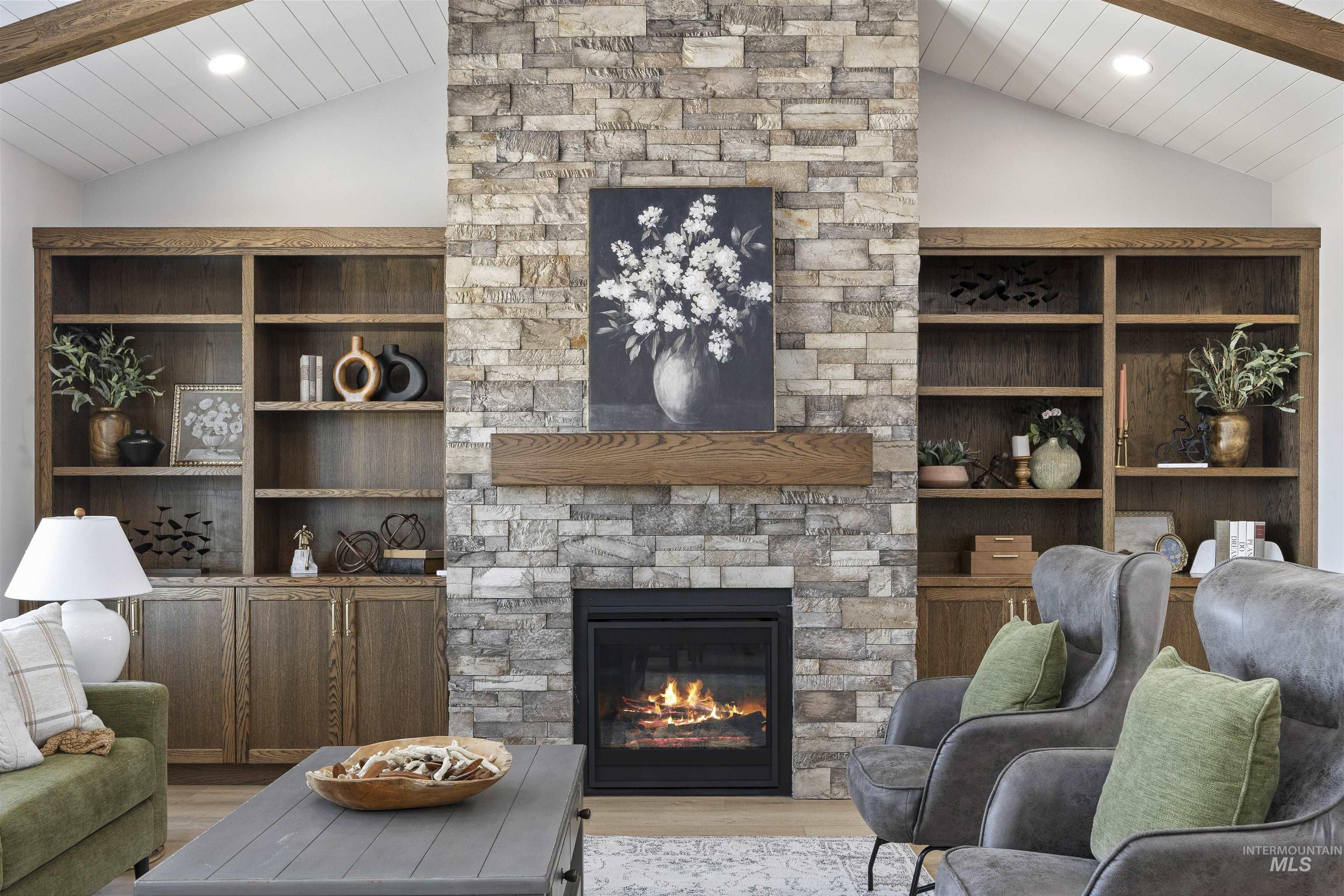 378 West 100 South Rupert, ID 83350 - Photo 9 of 50 Floor-to-ceiling stone fireplace featuring a wood mantel
