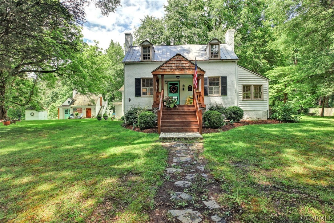 12200 Old Buckingham Road Midlothian, VA 23113 - Photo 2 of 9 Front of the house with old paved sidewalk.