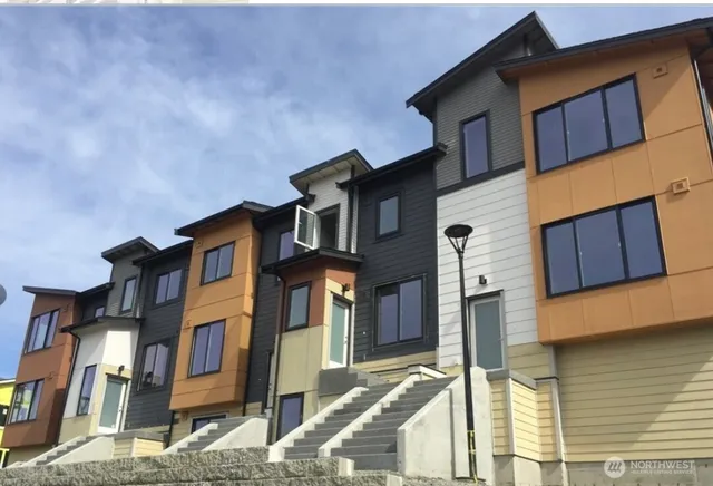 a view of a street with brick building in front of it
