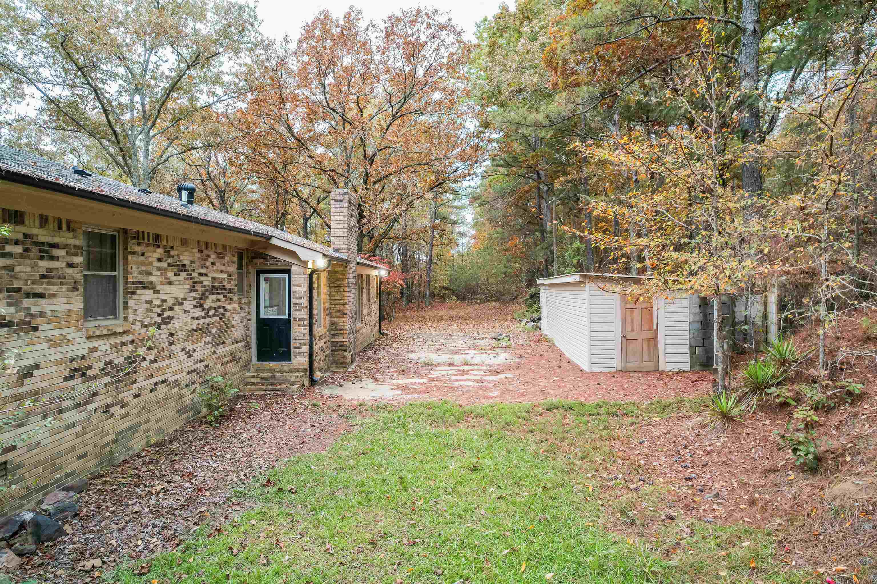 567 South 6th Street Selmer, TN 38375 - Photo 12 of 31 View of yard with a storage shed