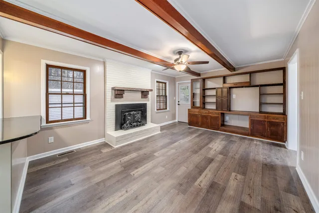 a kitchen with stainless steel appliances a refrigerator sink and cabinets