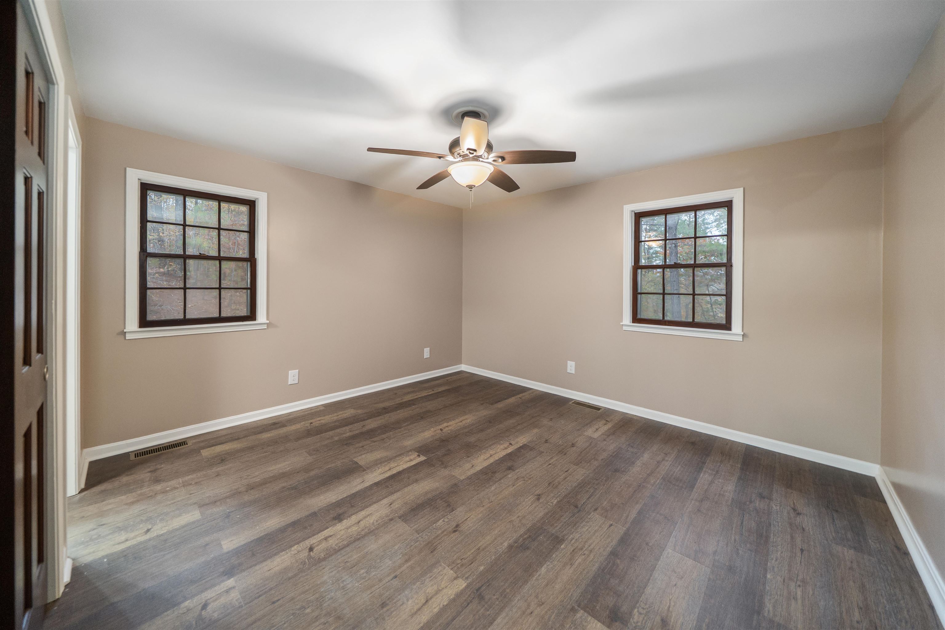 567 South 6th Street Selmer, TN 38375 - Photo 29 of 31 Unfurnished room featuring dark wood-type flooring and ceiling fan