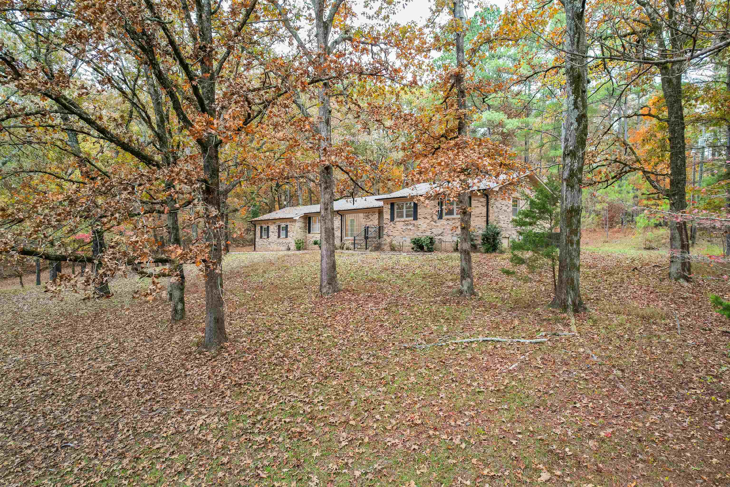 567 South 6th Street Selmer, TN 38375 - Photo 5 of 31 Ranch-style home featuring stone siding