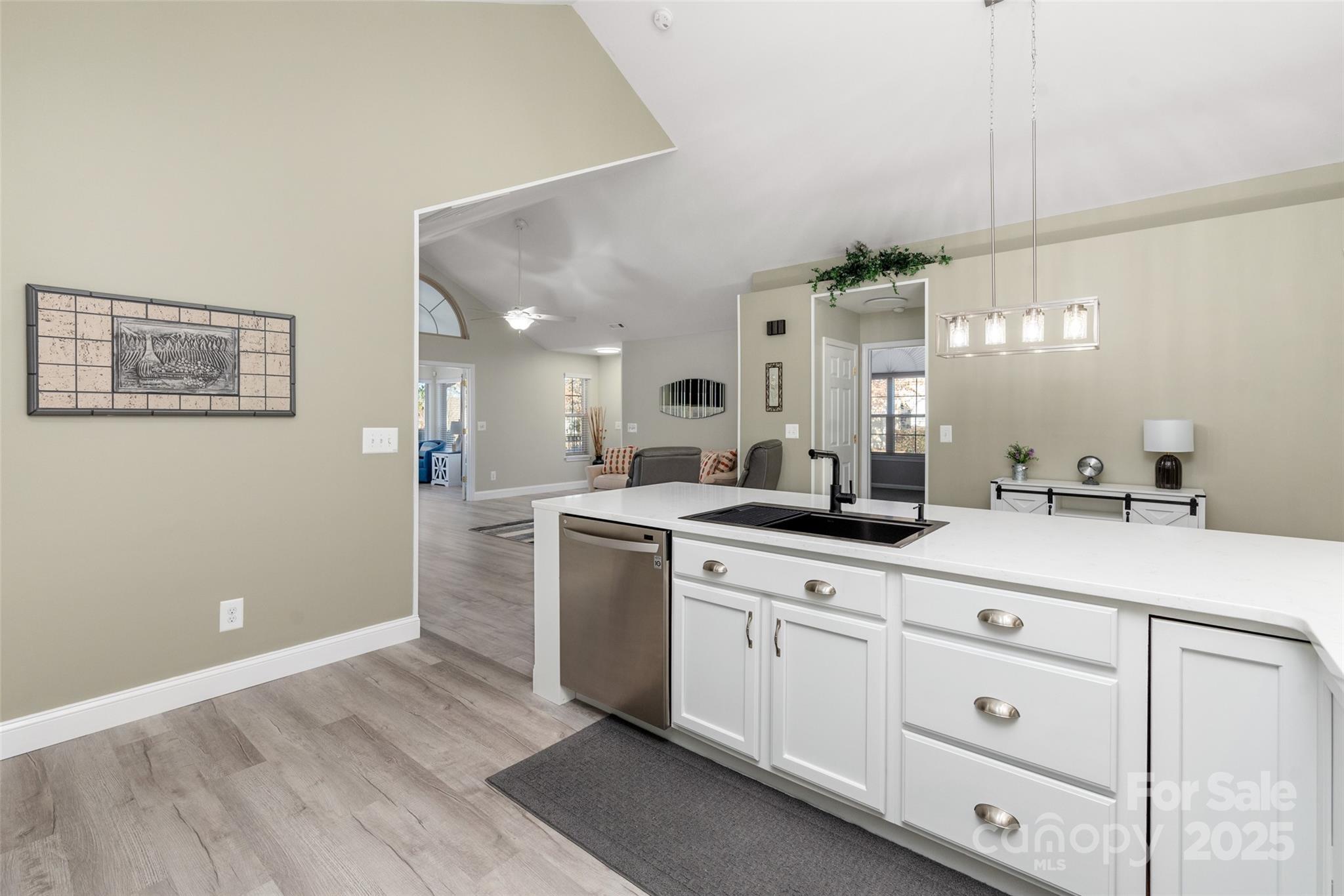 874 Ledgestone Court Tega Cay, SC 29708 - Photo 13 of 38 a spacious bathroom with a granite countertop sink a mirror and shower