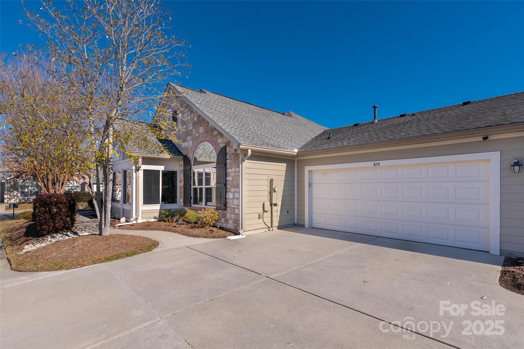 874 Ledgestone Court Tega Cay, SC 29708 - Photo 28 of 38 a view of a house with a outdoor space