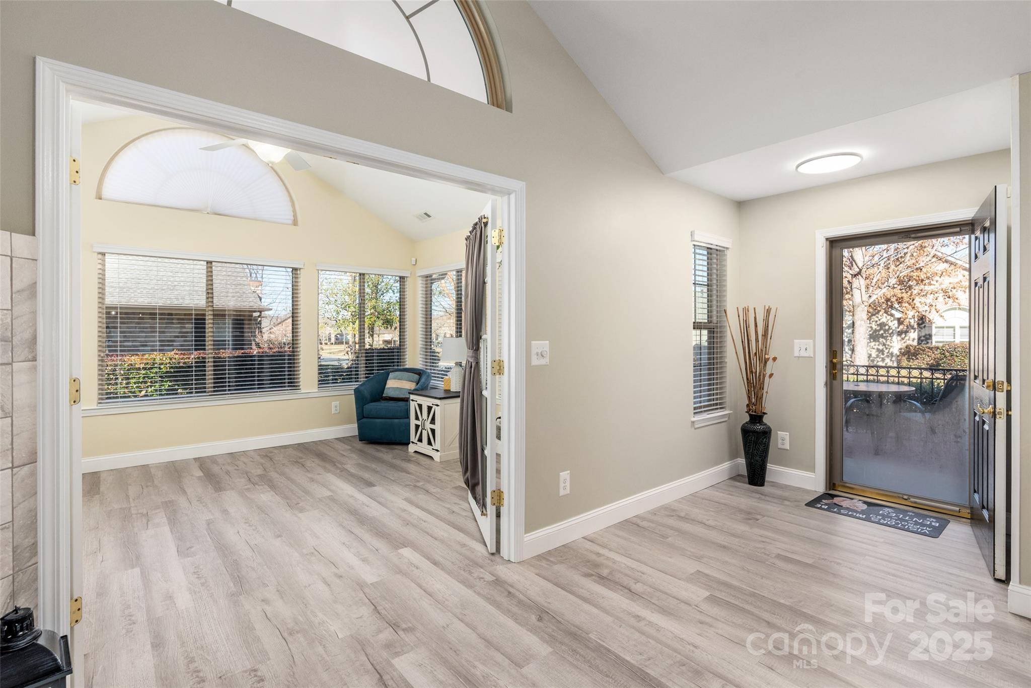874 Ledgestone Court Tega Cay, SC 29708 - Photo 4 of 38 a view of a room with wooden floor and furniture