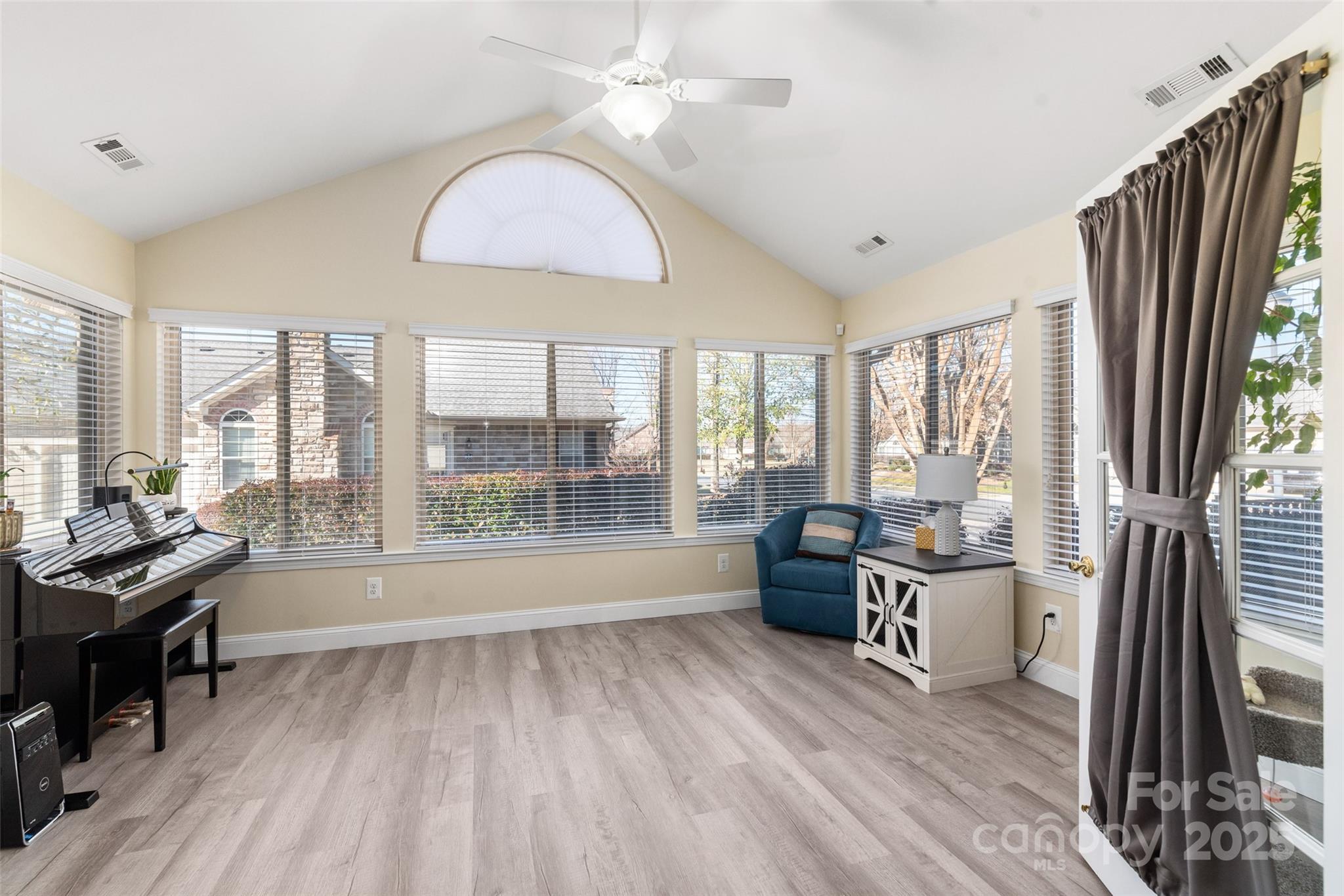 874 Ledgestone Court Tega Cay, SC 29708 - Photo 5 of 38 a room with lots of furniture and a large window