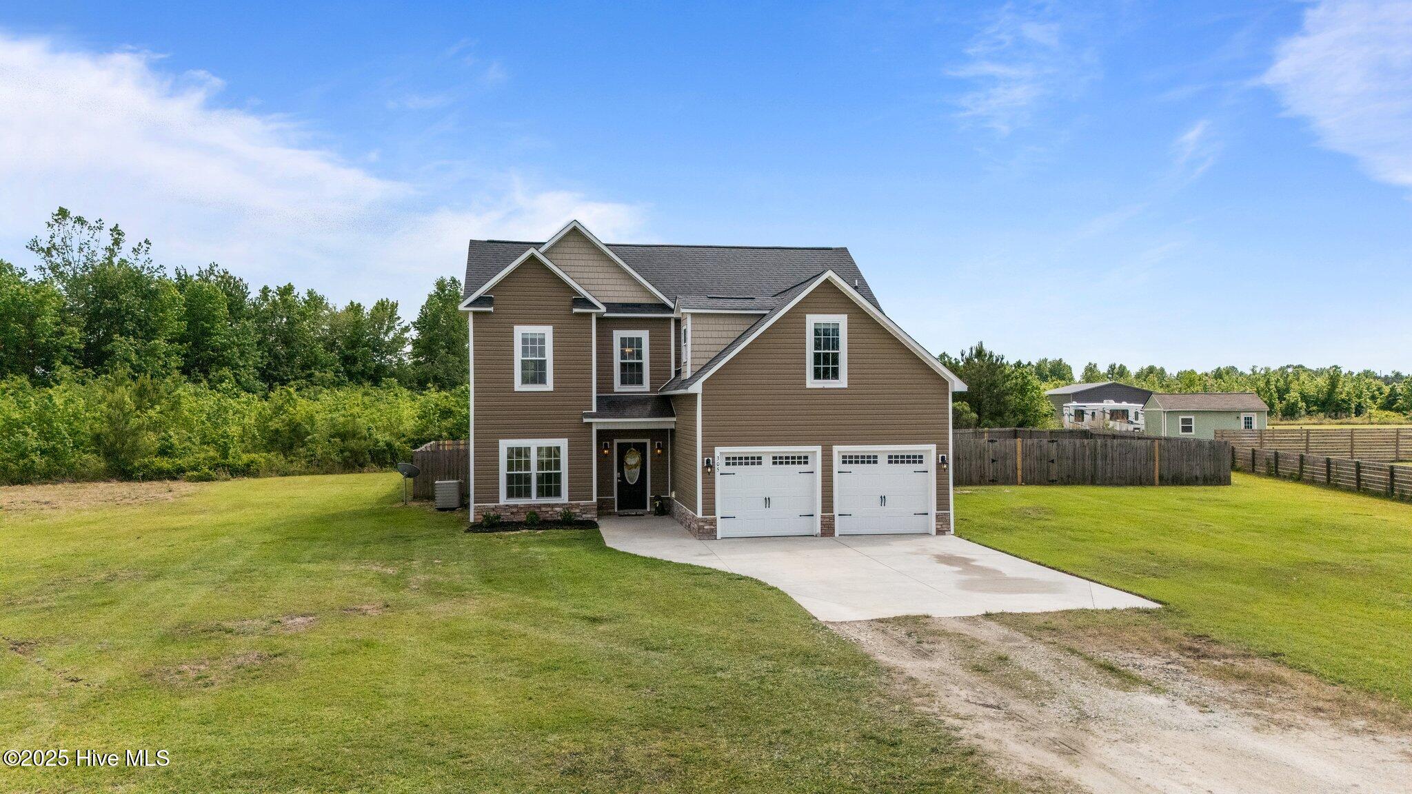 305 Spring Maple Way Richlands, NC 28574 - Photo 2 of 52 2-web-or-mls-DJI_20250506153215_0649_D