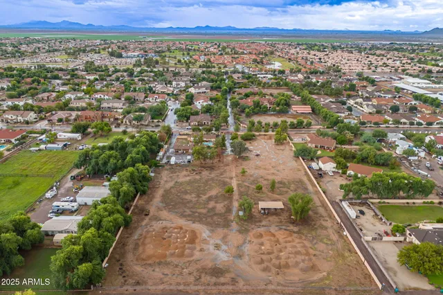 an aerial view of a city and mountain
