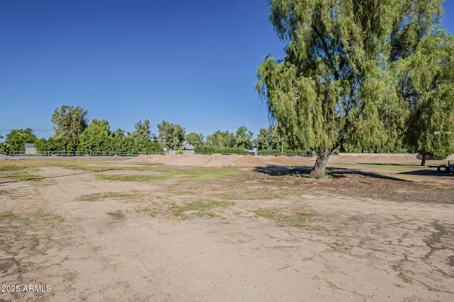 a view of a road with a yard