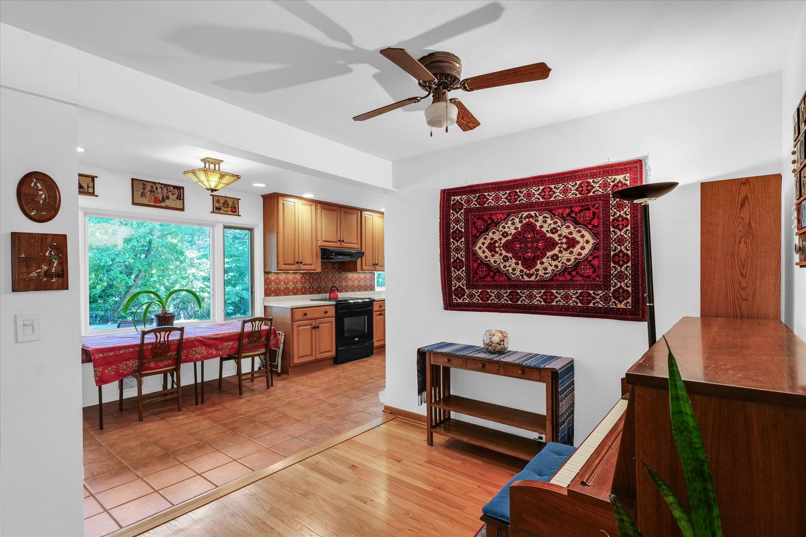 1505 Alma Drive Champaign, IL 61820 - Photo 12 of 50 a living room with furniture a window and a flat screen tv
