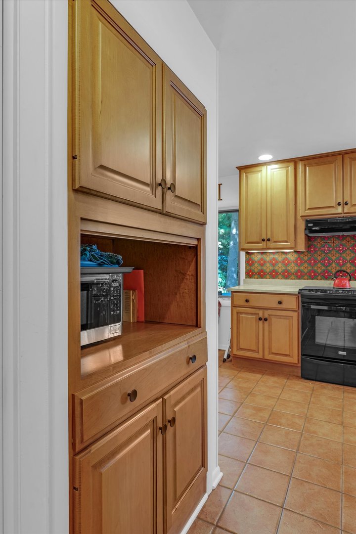 1505 Alma Drive Champaign, IL 61820 - Photo 21 of 50 a kitchen with granite countertop cabinets stainless steel appliances and a counter space