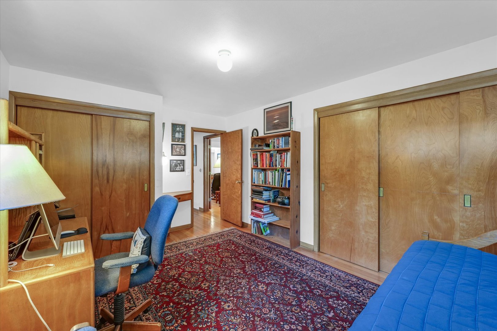 1505 Alma Drive Champaign, IL 61820 - Photo 23 of 50 a view of a bedroom with furniture and wooden floor