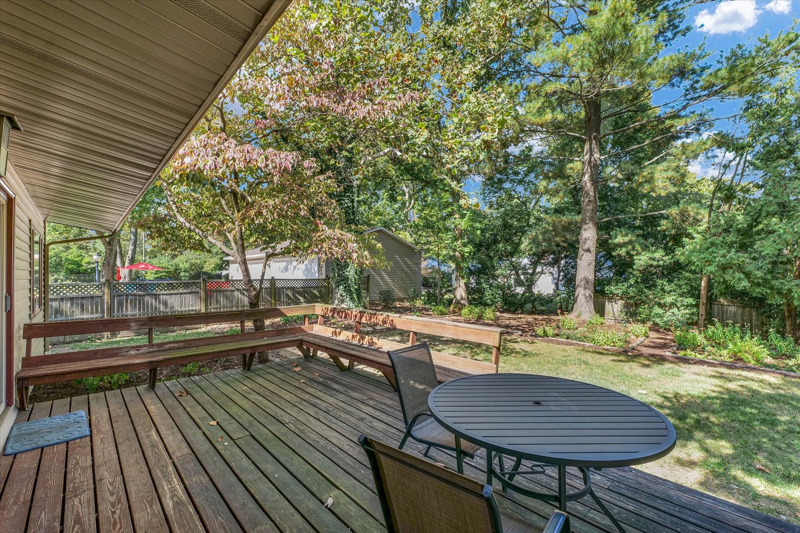 1505 Alma Drive Champaign, IL 61820 - Photo 48 of 50 a view of a chairs and table on the wooden deck