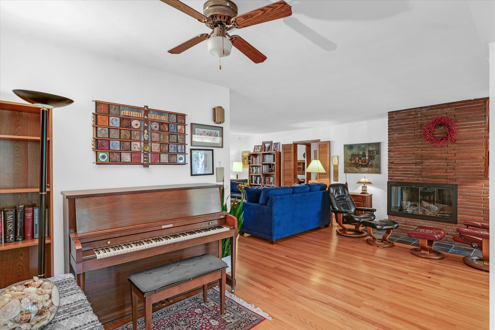 1505 Alma Drive Champaign, IL 61820 - Photo 10 of 50 a living room with furniture a rug and a fireplace