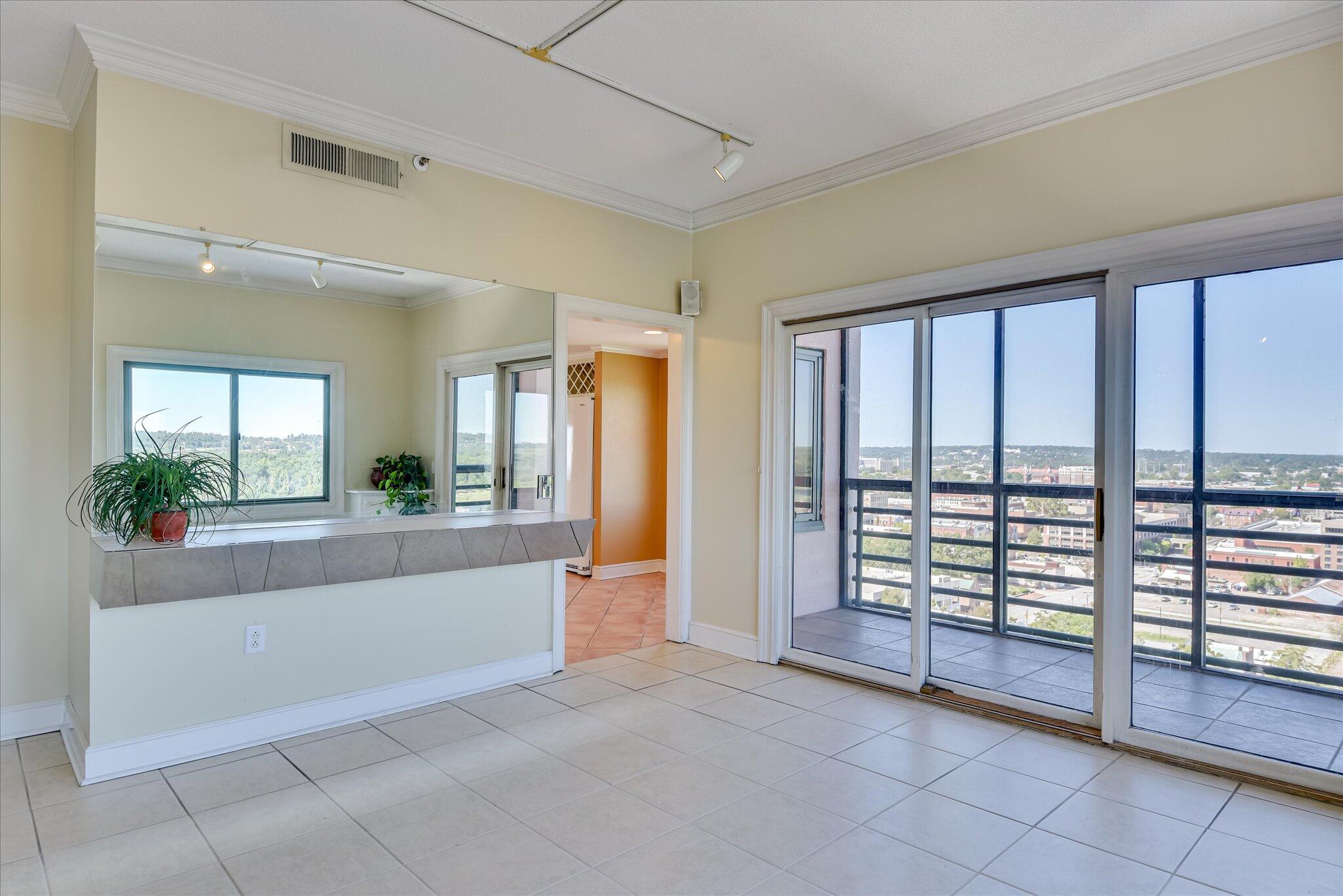1 7th Street, Unit 1602 Augusta, GA 30901 - Photo 3 of 61 Dinning area Dry Bar/Buffett and Balcony Entry
