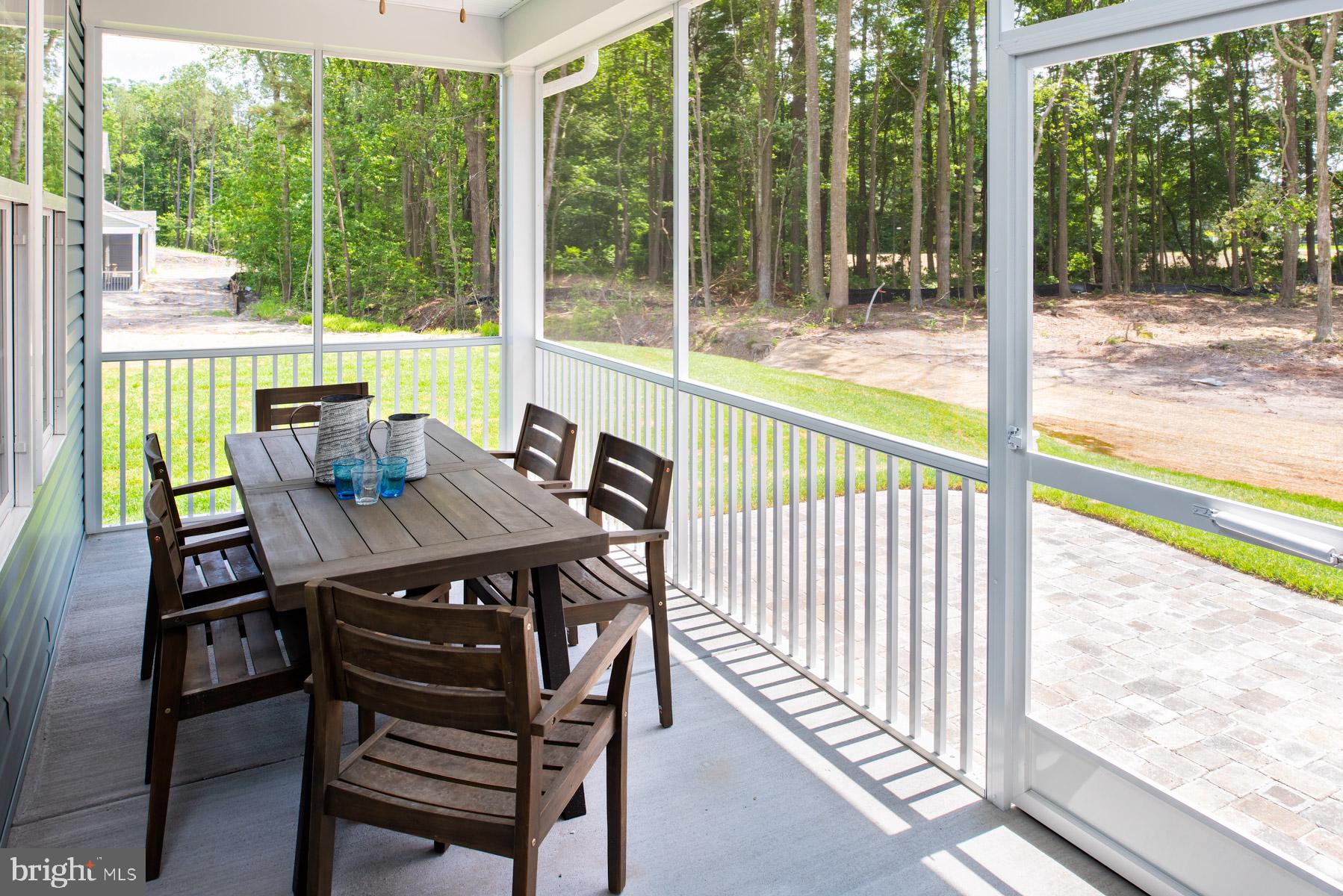 38412 Carroll Drive Millville, DE 19967 - Photo 9 of 22 SCREENED-IN PORCH