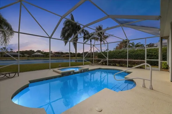 a view of a house with a swimming pool