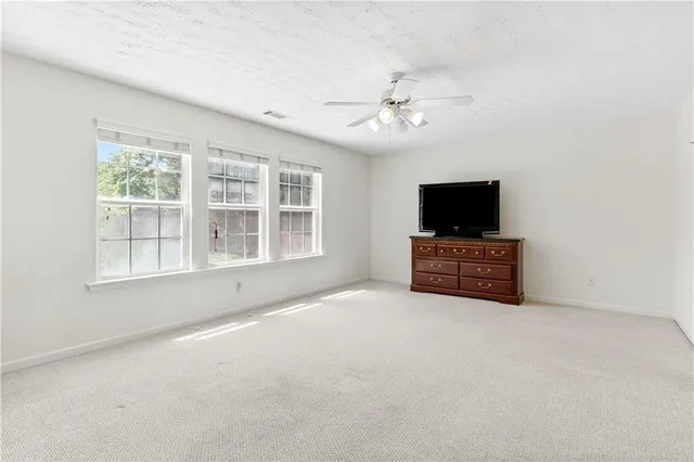 a view of a livingroom with a flat screen tv